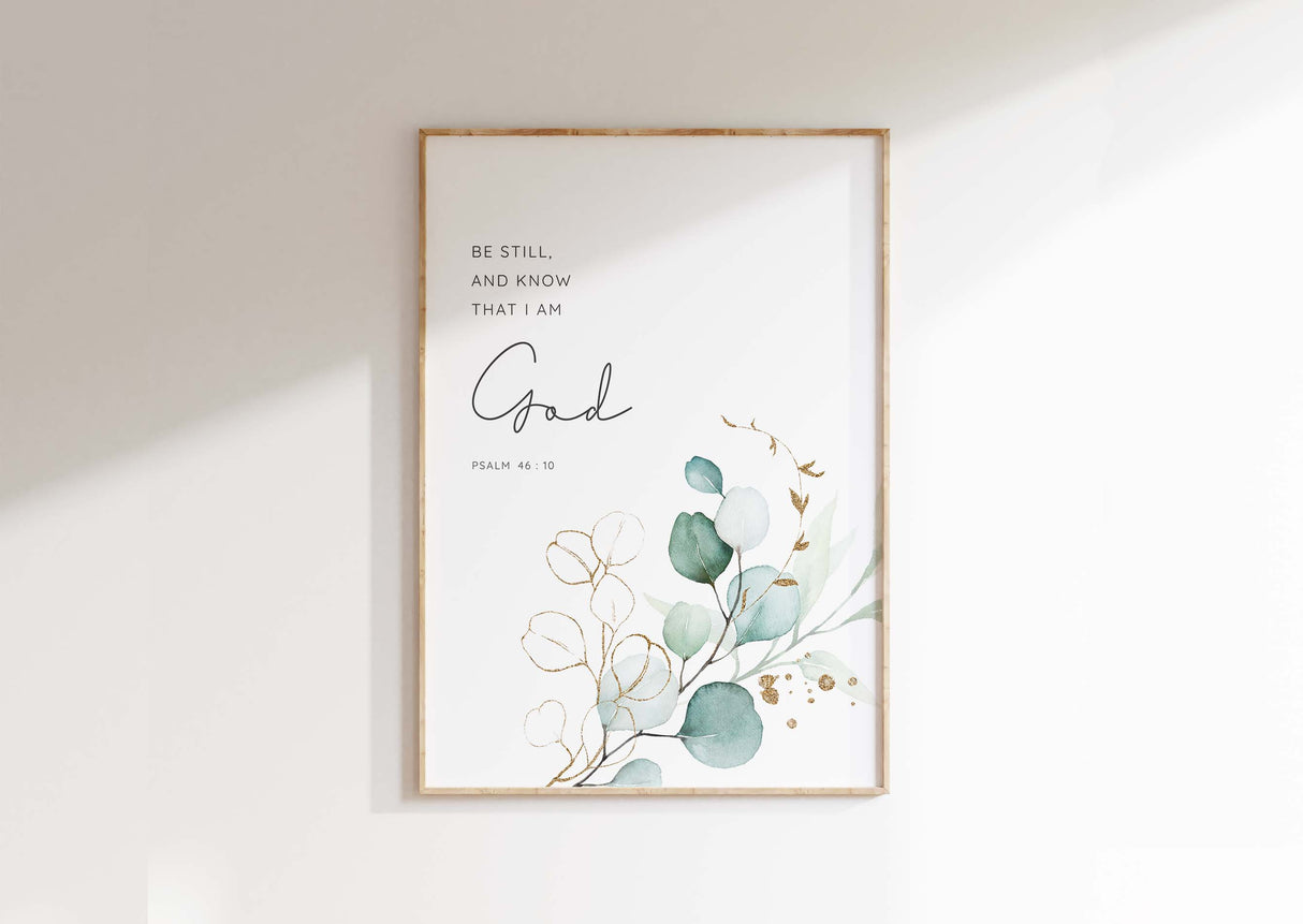Psalm 46:10 - Be still and know Christian wall art with serene green botanical leaves, calming Bible verse faith decor.