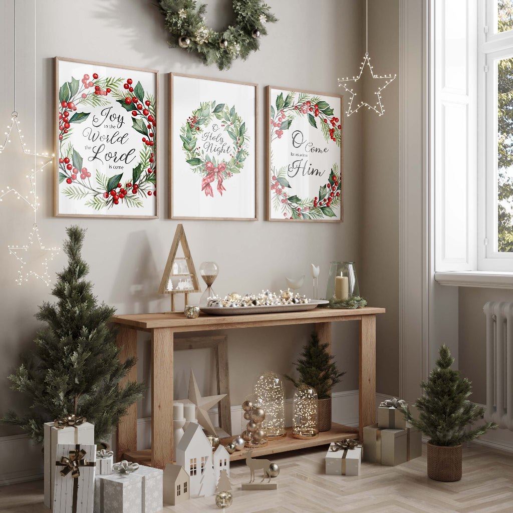 Christmas carol wreath art set, perfect for seasonal home decor. Green and red wreath print set with Christmas carol quotes.