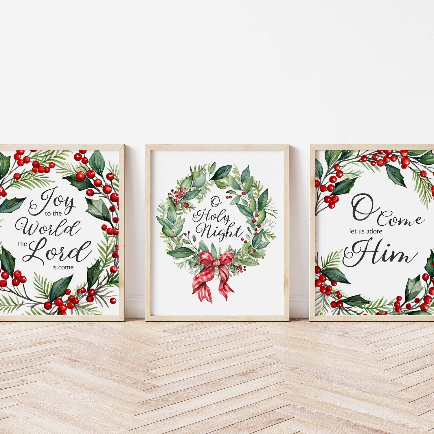 Traditional Christmas carol print set with holly and berry wreaths. Decorative prints featuring carol lyrics encircled by holiday wreaths.