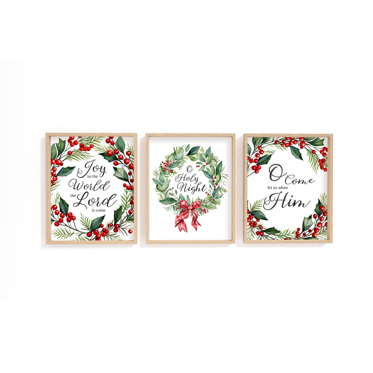 Set of 3 Christmas carol prints framed by festive wreath elements. Joy to the World, O Holy Night, and O Come Let Us Adore Him prints.