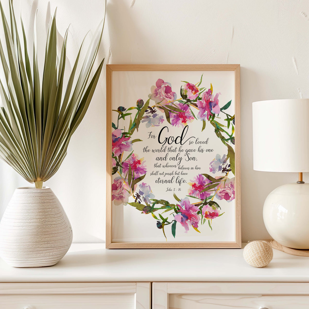 John 3:16 - Bible verse print featuring soft pink flowers surrounding gospel scripture on cream background.