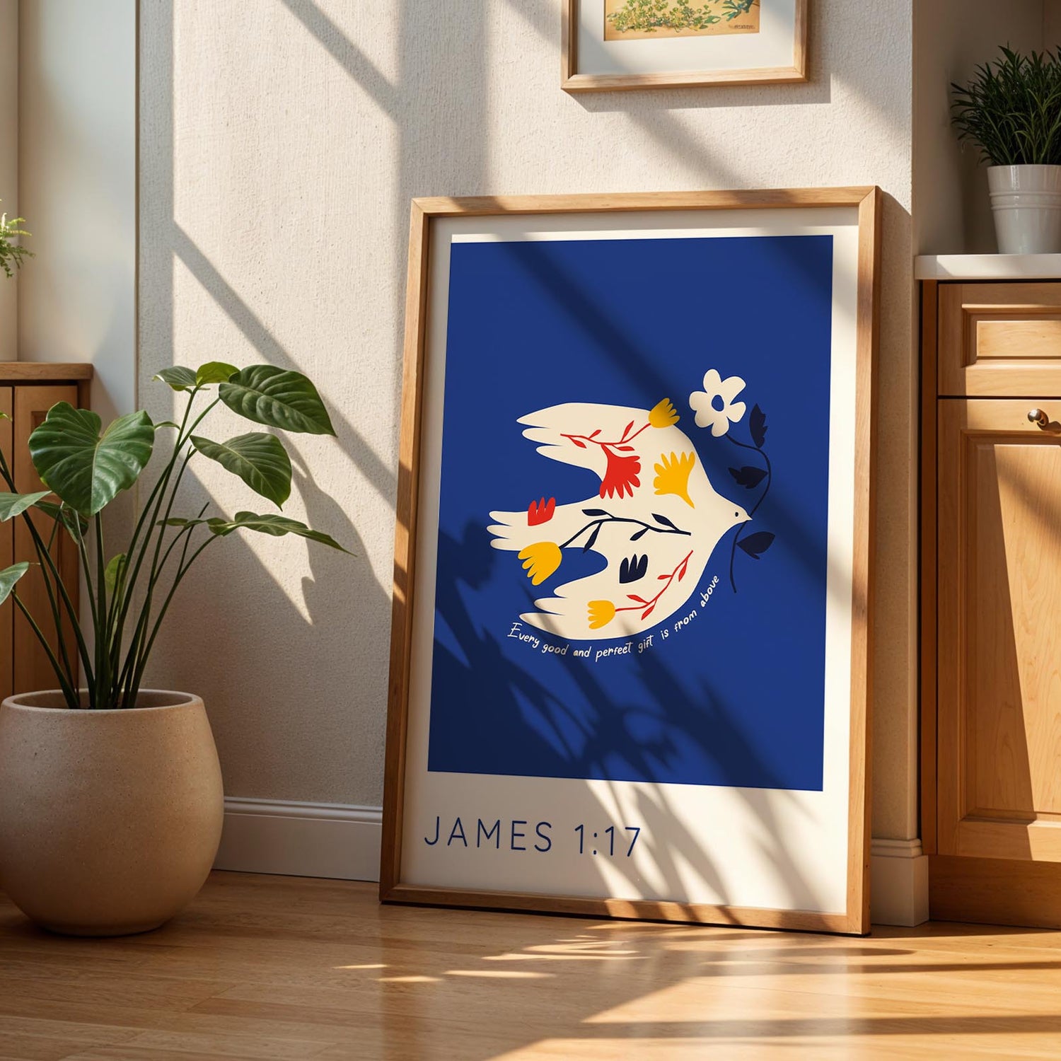 Elegant bird-themed wall art with the quote "Every good and perfect gift comes from above" on a blue backdrop.