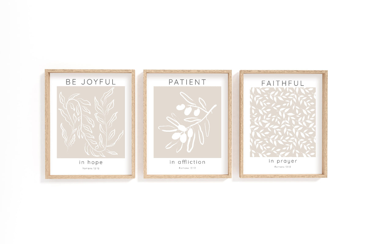Romans 12:12 – Be joyful in hope Christian wall art 3 print set with neutral beige background and white botanical design.