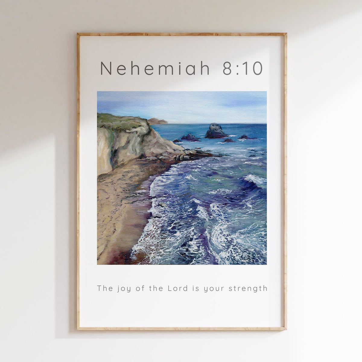 Blue-toned beach wall art with “The joy of the Lord is your strength” – a comforting Christian gift idea.