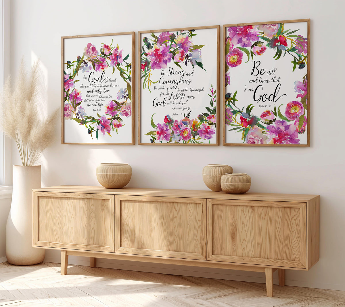 Christian Bible verse wall art triptych with delicate floral borders, featuring “Be still and know,” John 3:16, and Joshua 1:9.