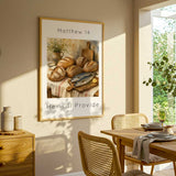 Matthew 14 - Scripture wall art featuring rustic loaves of bread and two fish on wooden board with warm textured background.