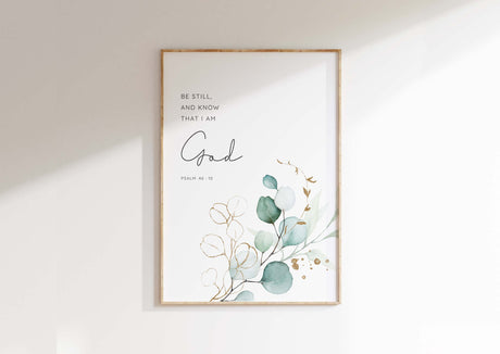 Psalm 46:10 - Be still and know Christian wall art with serene green botanical leaves, calming Bible verse faith decor.