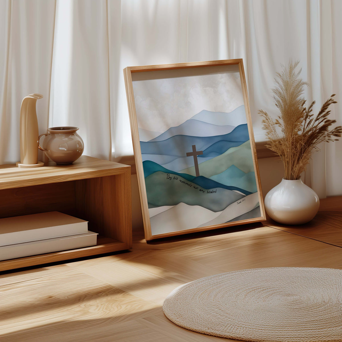 Isaiah 53:5 – By His wounds we are healed Christian wall art with blue grey mountains and central cross design.