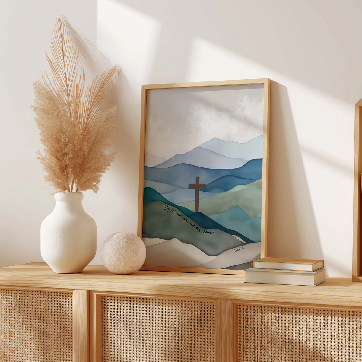 Isaiah 53:5 – Christian scripture wall art with blue grey hills and cross symbolising Christ’s healing sacrifice.