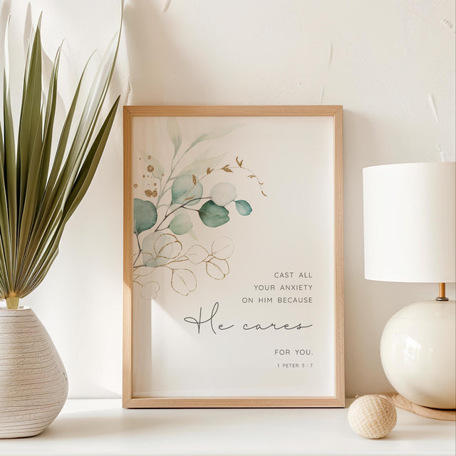 1 Peter 5:7 – Minimalist Christian wall art with green leaf botanical design and comforting Bible verse about casting anxiety on God.