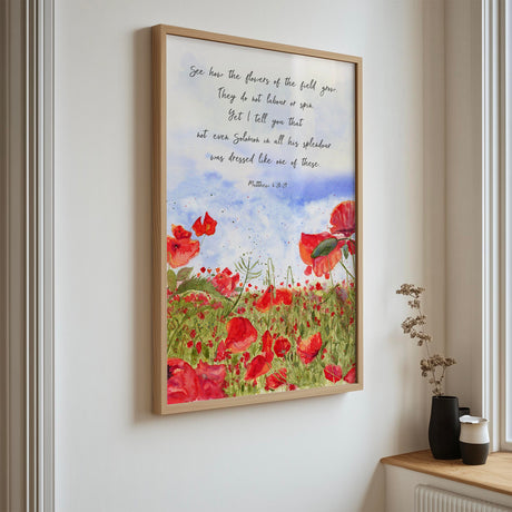 Matthew 6:28–29 – Christian scripture wall art with floral meadow illustration and Bible verse inspired by nature and faith.