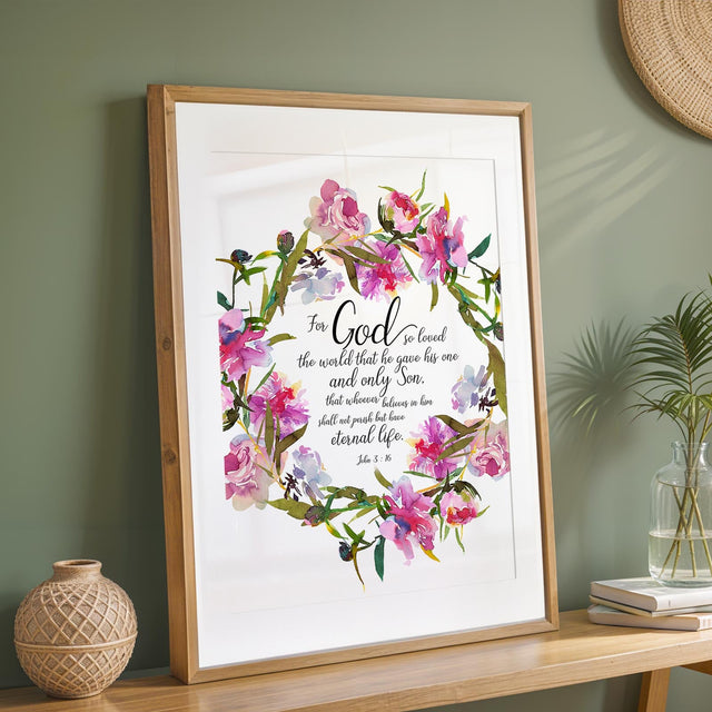 John 3:16 - Scripture wall art with delicate floral wreath and God so loved the world verse in elegant font.