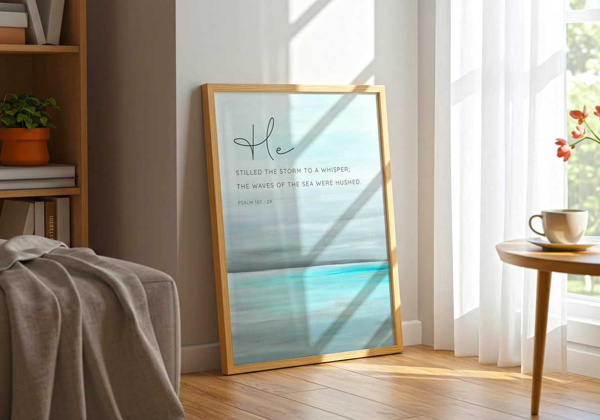 Psalm 107:29 - Abstract seascape bible quote art with turquoise ocean, grey sky and He stilled the storm scripture for coastal decor.