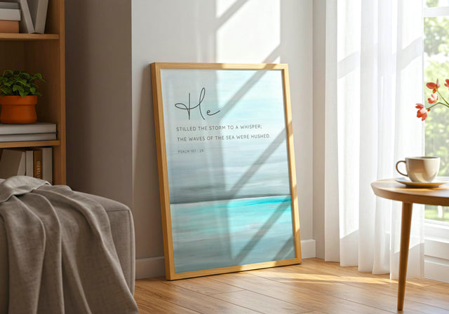 Psalm 107:29 - Abstract seascape bible quote art with turquoise ocean, grey sky and He stilled the storm scripture for coastal decor.