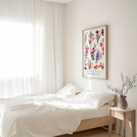 Proverbs 31:25 - She is clothed with strength Christian wall art with colourful floral design, inspirational Bible verse decor.