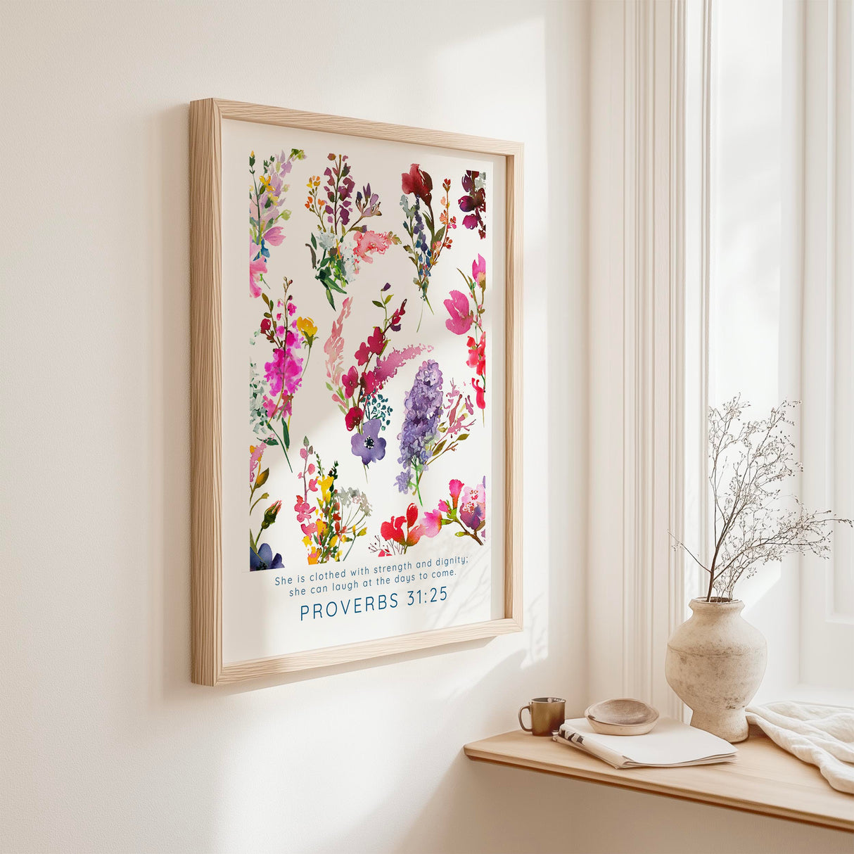 Proverbs 31:25 - She is clothed with strength and dignity Bible verse wall art, vibrant floral Christian home decor.