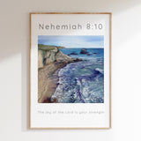Blue-toned beach wall art with “The joy of the Lord is your strength” – a comforting Christian gift idea.
