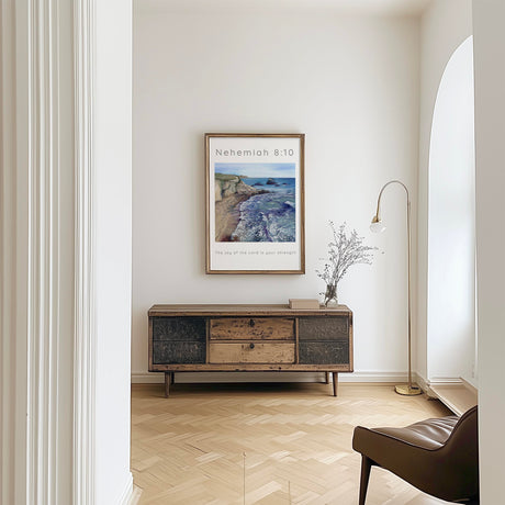 Scripture print showing waves and cliffs with the Bible verse "The joy of the Lord is your strength" in peaceful blue tones.