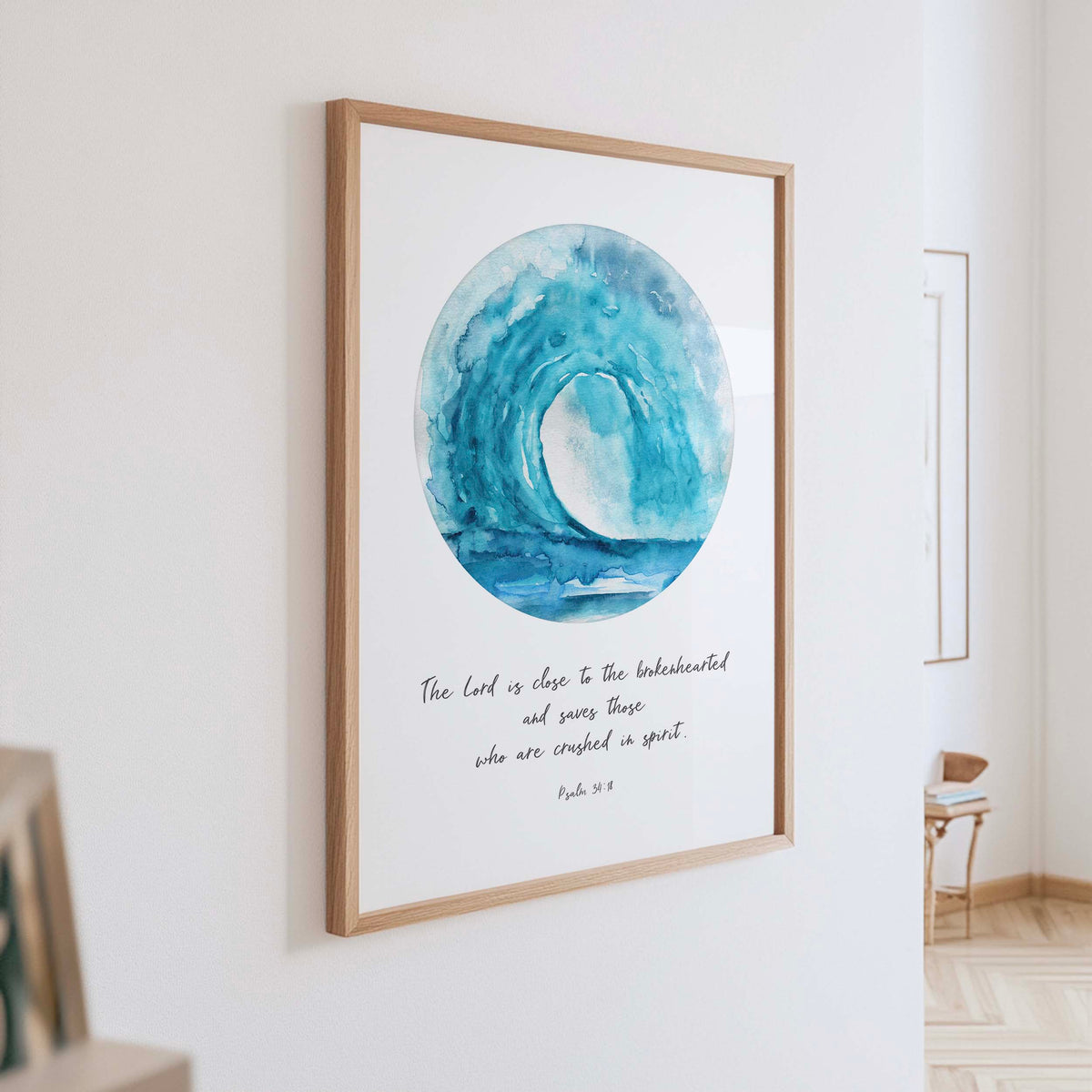 Christian wall art print featuring a soothing turquoise wave with the Bible verse “The Lord is close to the brokenhearted” from Psalm 34:18.