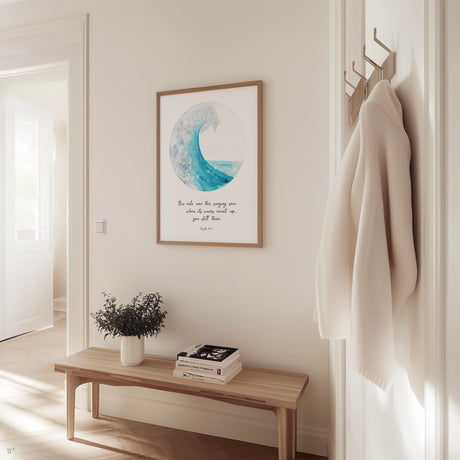 Ocean-inspired Christian wall art print showing a turquoise wave in a circular design with the Bible verse “You rule over the surging sea” from Psalm 89:9.