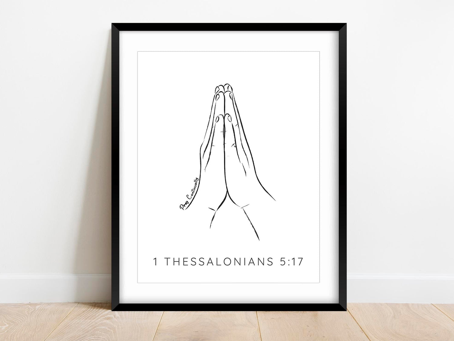 Constantly connected: A minimalist print featuring praying hands and the powerful message of 'Pray Continually' - find peace within.