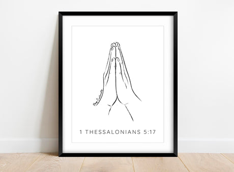 Constantly connected: A minimalist print featuring praying hands and the powerful message of 'Pray Continually' - find peace within.