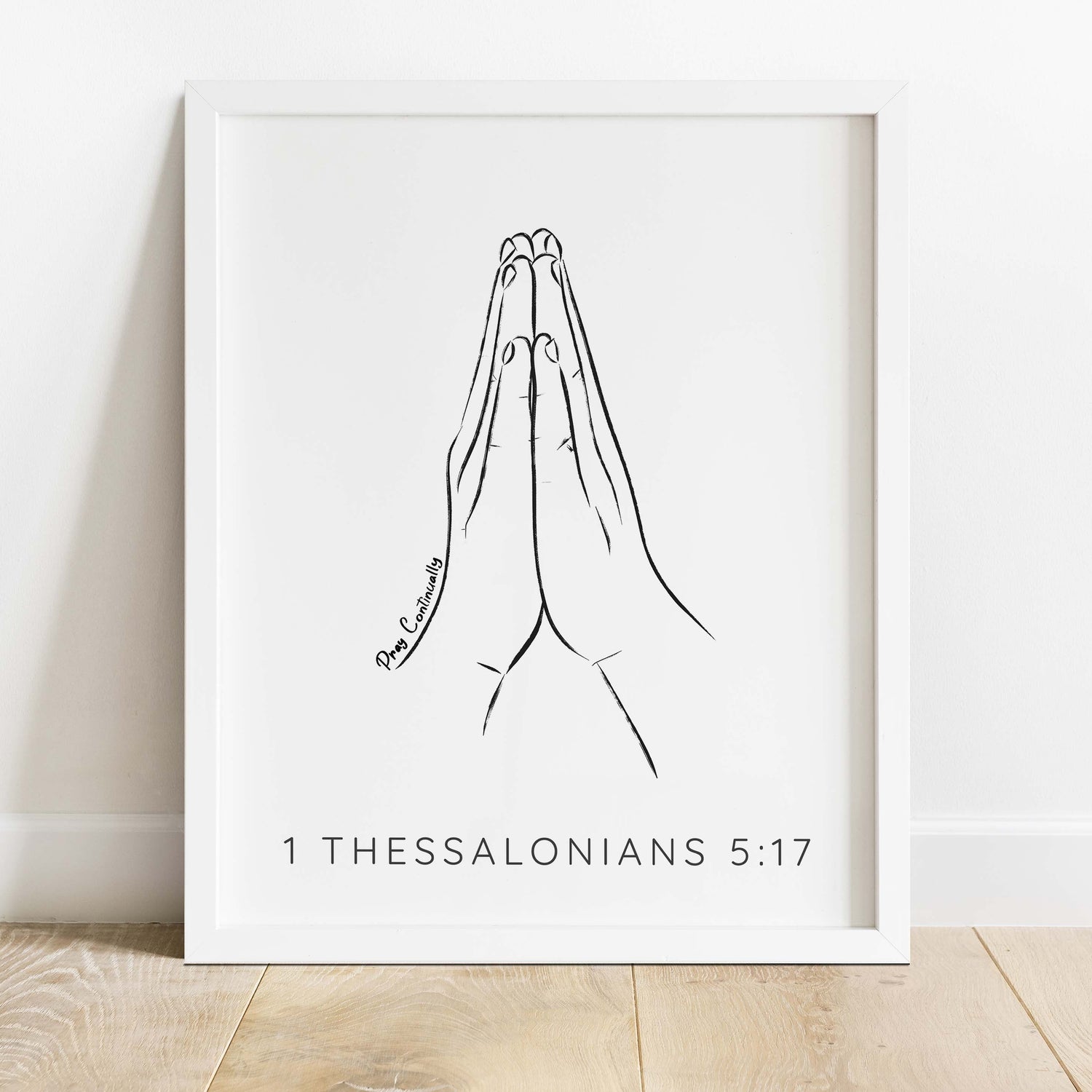 Minimalist art with a spiritual touch - praying hands and 'Pray Continually' quote, a daily reminder to seek divine guidance.