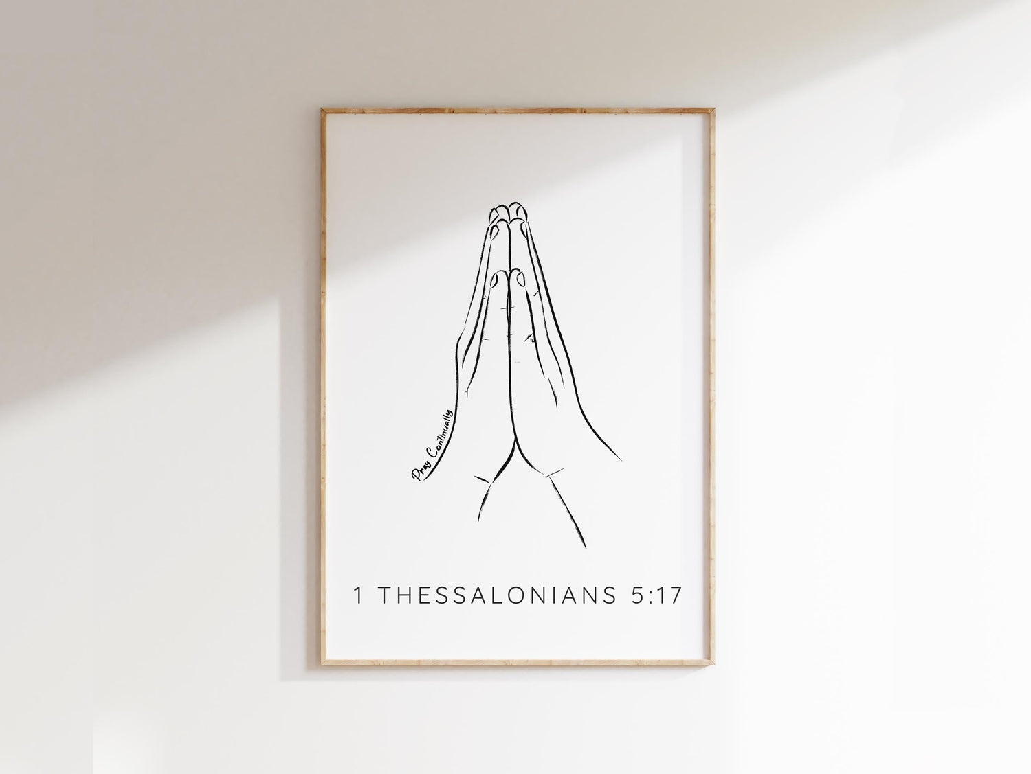 Grace your space with a minimalist 1 Thessalonians 5:17 print - praying hands and 'Pray Continually' quote, a symbol of faith.